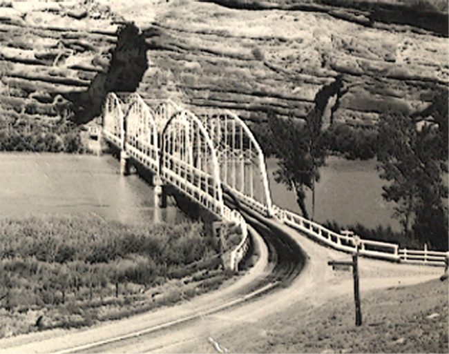 'Jack Holley's cabin would have been just below the bottom of this old Harry Reed postcard, on the right side of the road.'