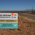 A yard sign-style campaign message of the San Juan County Democratic Party on Highway 262 just inside the Aneth extension of the Navajo Nation was modified in advance of a special election on Nov. 5. The signs were positioned along highways in the southern part of the county. (Bill Keshlear)