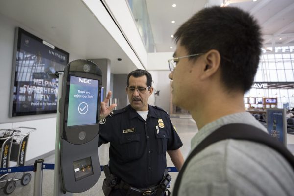 U.S. Customs and Border Protection, Office of Field Operations, officers take biometric photos of passengers prior to boarding a flight at Houston International Airport on February 12, 2018.   Photographer: Donna Burton