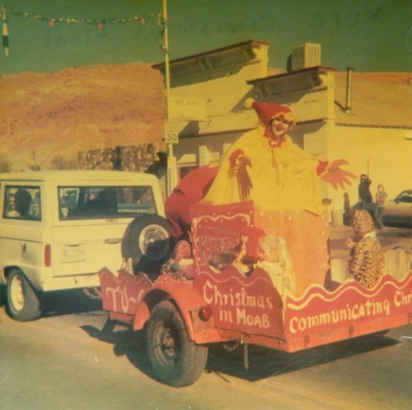 KURA's Float in the 1972 Moab Christmas Parade. Note Tom Balsley's Sears store in the background. Photo courtesy Deeanne Tranter Atwood.