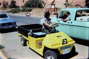 the yellow Cushman cart