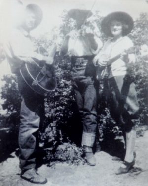 Otho Murphy (Center), playing music with his brother Tom and niece Verona Stocks.