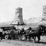 On one of her early trips to Kayenta, Lillian Wilhelm and her friends had to revert to old ways. Elephants Feet formation in the background. “Each time a Navajo hitched his ponies to a stubborn mass of metal and towed it to its destination, he thought a white man was stupid to forget that a horse was his best friend,” wrote Lillian’s friend, Mildred Kaye Smith.