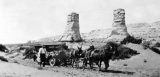 On one of her early trips to Kayenta, Lillian Wilhelm and her friends had to revert to old ways. Elephants Feet formation in the background. “Each time a Navajo hitched his ponies to a stubborn mass of metal and towed it to its destination, he thought a white man was stupid to forget that a horse was his best friend,” wrote Lillian’s friend, Mildred Kaye Smith.