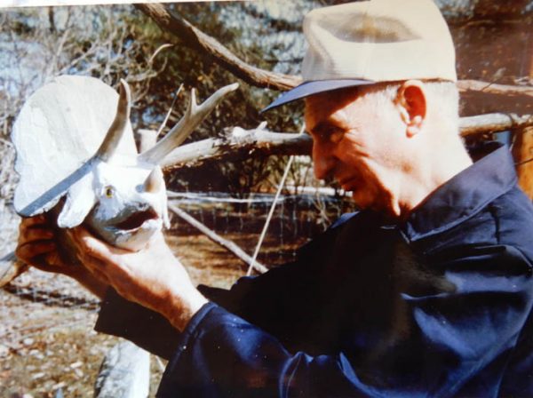 George with one of his Dinosaurs. Photo by Doc Bell