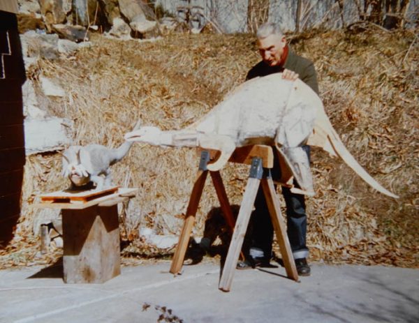 George at work with his dinosaurs. Photo by Doc Bell.