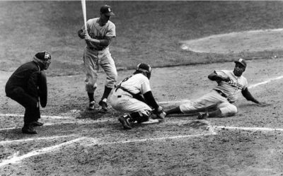 Jackie Robinson "Steals Home" in Game 1 of the 1955 World Series. AP Photo