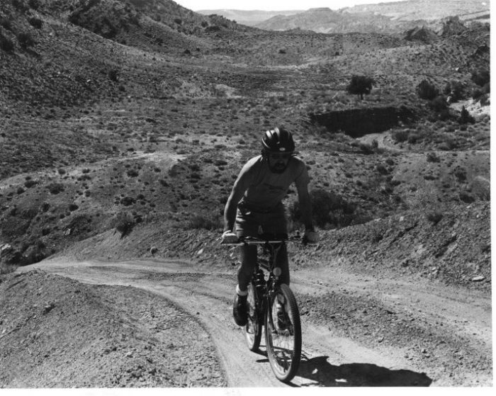 Charging up a hill in Arches National Park on the Delicate Arch Road during the summer of 1984. Photo by Kris Davis.