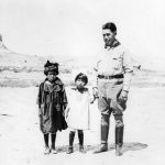 The artist and cartoonist, James Swinnerton, on the right with some real canyon kiddies—Betty and Fanny Wetherill