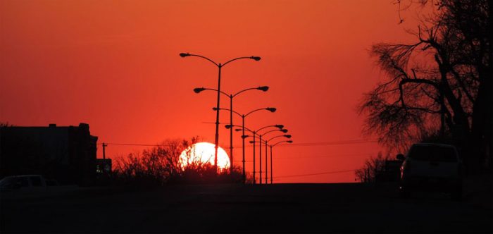 The sun setting over Main Street. Photo by Jim Stiles